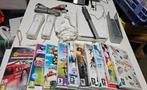 Nintendo Wii met 2 controllers, nunchuks en 11 spellen, 3 spelers of meer, Ophalen of Verzenden, Zo goed als nieuw, Vanaf 3 jaar