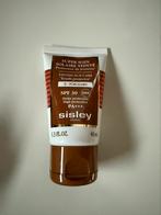 Sisley tinted suncare nr 0 porcelain, Ophalen of Verzenden, Nieuw, Gehele gezicht, Verzorging