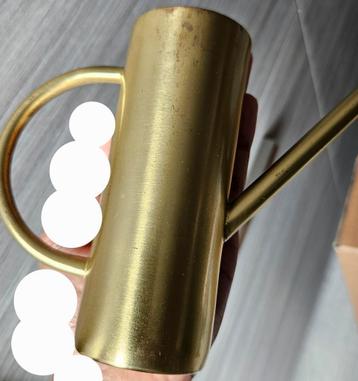Leuke gouden decoratie watergieter beschikbaar voor biedingen