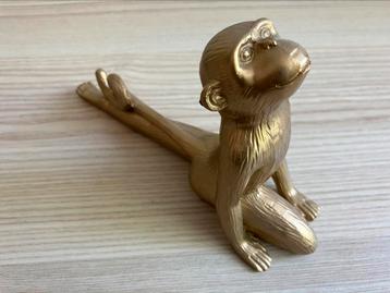 Goud kleurige yoga aapjes als nieuw beschikbaar voor biedingen