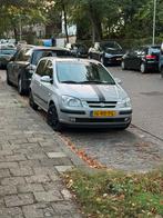 Hyundai Getz 1.3 5DRS 2005 Grijs, Auto's, Voorwielaandrijving, 4 cilinders, Origineel Nederlands, Handgeschakeld