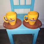 Chocomel bekers met bruine schotel 2 stuks, Huis en Inrichting, Keuken | Servies, Ophalen, Glas of Glazen, Zo goed als nieuw, Overige stijlen