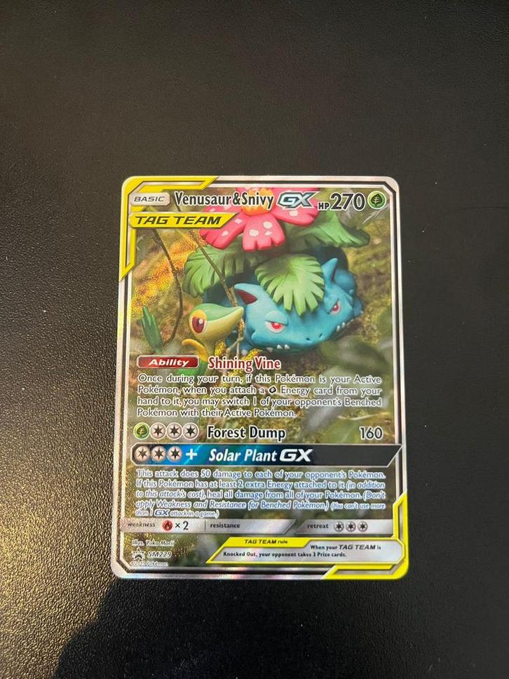 Venusaur & Snivy GX (SM 229) Sun & Moon Promo, Hobby en Vrije tijd, Verzamelkaartspellen | Pokémon, Zo goed als nieuw, Ophalen of Verzenden