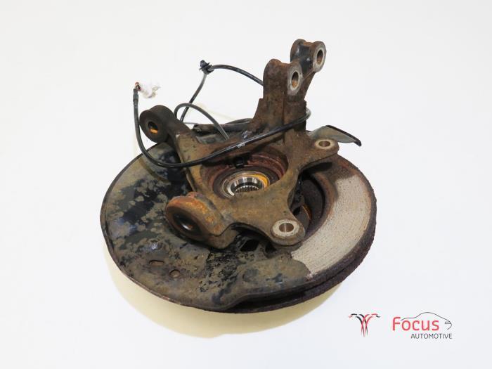 Fusee links-voor van een Toyota Yaris, Auto-onderdelen, Ophanging en Onderstel, Toyota, Gebruikt, 6 maanden garantie, 12 maanden garantie