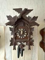 Koekoeksklok met vogel en bladeren, Ophalen