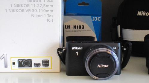 Nikon 1 S2 mirrorless camera met 2 lenzen en doos, Audio, Tv en Foto, Fotocamera's Digitaal, Gebruikt, Nikon, 4 t/m 7 keer, Ophalen of Verzenden