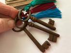 Antieke sleutel met sierkwast, Antiek en Kunst, Curiosa en Brocante, Ophalen of Verzenden