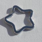 Zilverkleurige metalen sleutelhanger in de vorm van een ster, Verzenden, Nieuw, Materiaal