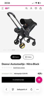 Doona Autostoel met Isofix Base + Regenhoes, Zijbescherming, Zo goed als nieuw, Isofix, 0 t/m 13 kg