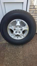Mitsubishi Pajero Velg met band 265 70 R16 LandcruiserPatrol, Ophalen, Gebruikt, Mitsubishi