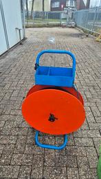 Professionele Signode accu omsnoeringsmachine + band & dispe, Ophalen