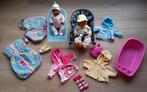 Poppen met badjes, wipstoeltje, kleding, slaapzak, draagzak, Ophalen of Verzenden, Gebruikt, Babypop