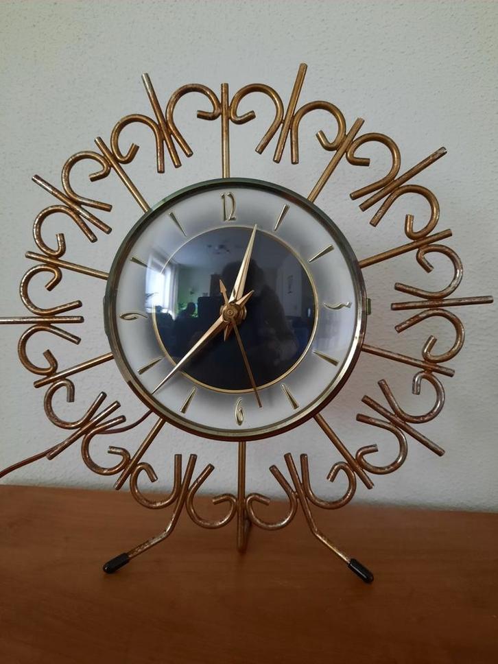 Mid-century zonneklok van NUFA, Huis en Inrichting, Woonaccessoires | Klokken, Zo goed als nieuw, Wandklok, Ophalen