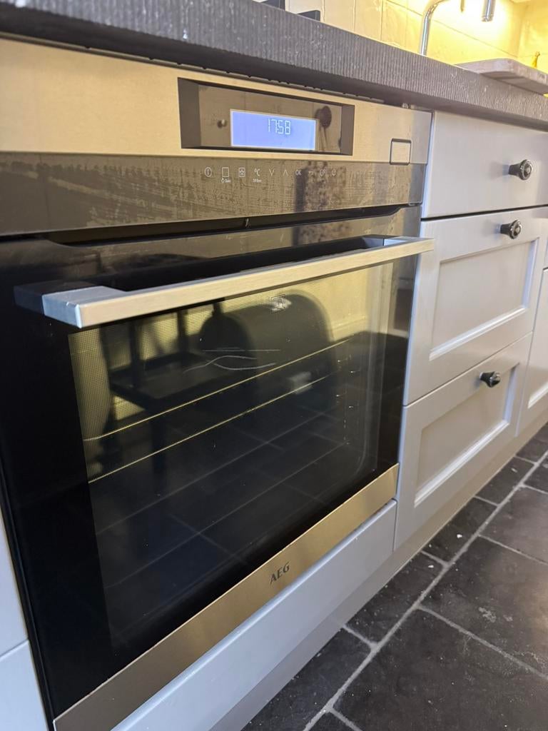 Multifunctionele oven met stoomfunctie AEG, Witgoed en Apparatuur, Ovens, Ophalen, Zo goed als nieuw, Hete lucht, 45 tot 60 cm