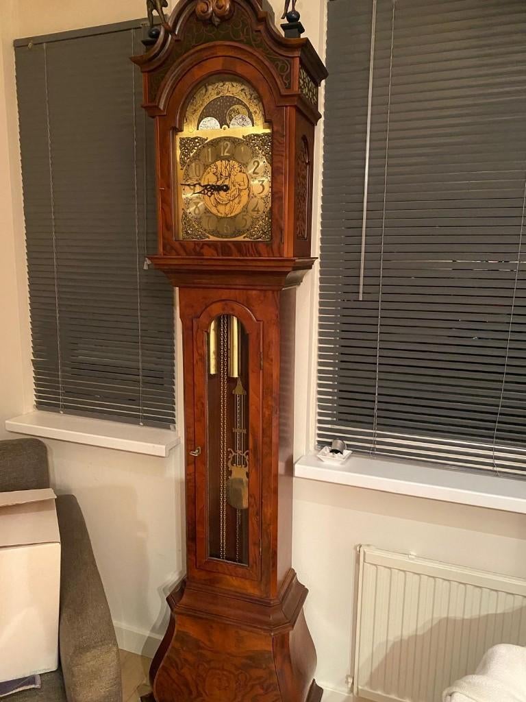 klassiek staande klok type Amsterdams Horloge, Ophalen