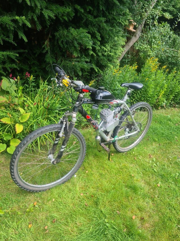 Fiets met motorblok 90 cc, Ophalen