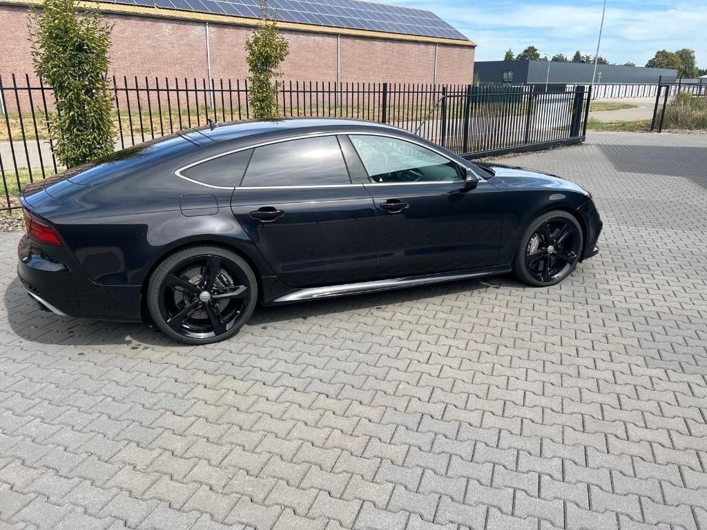 Audi RS7 4.0 Tfsi 412KW Quattro S-tronic 2017 Zwart, Auto's, 1905 kg, 4 stoelen, Vierwielaandrijving, Navigatiesysteem