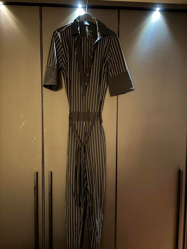 Zwarte jumpsuit met strepen zip73, Kleding | Dames, Verzenden, Zo goed als nieuw, Maat 38/40 (M), Zwart