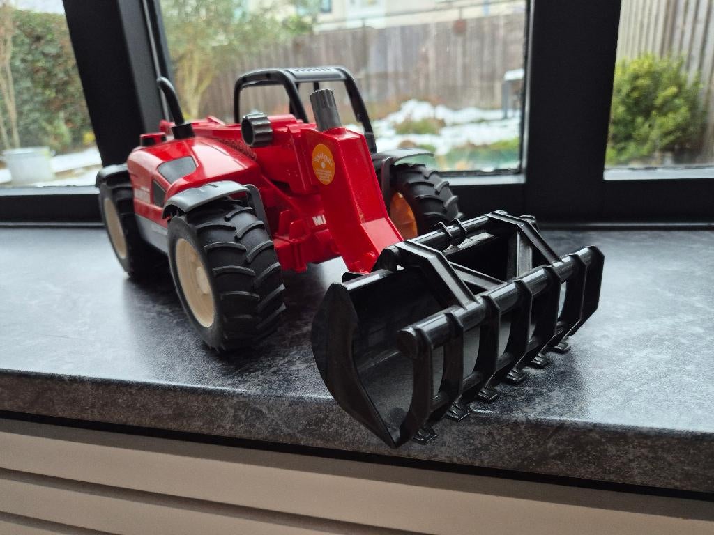 Bruder Manitou MLT 633 Verrijker, Ophalen of Verzenden, Gebruikt