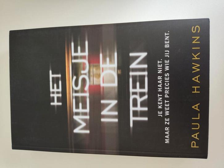 Paula Hawkins - Het meisje in de trein, Boeken, Thrillers, Zo goed als nieuw, Ophalen of Verzenden
