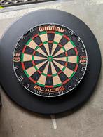 Winau blade 4 dartbord met beschermingsrand zwart., Sport en Fitness, Darts, Zo goed als nieuw, Ophalen, Dartbord