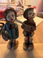 Twee antieke beeldjes jongetje en meisje gesigneerd EIG.L.V., Ophalen of Verzenden, Mens