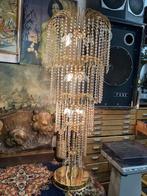 Swarovski lamp, Ophalen