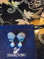 Splinternieuw ariane grande schelp parel oorbellen swarovski, Ophalen of Verzenden, Zo goed als nieuw, Overige materialen