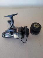 Shakespeare sigma 2400-040 graphite met extra spoel, Ophalen of Verzenden, Zo goed als nieuw, Molen