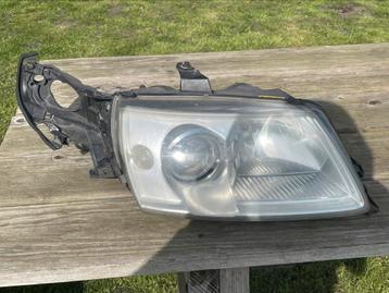Saab 9-5 Aero xenon koplampen 100 euro beschikbaar voor biedingen