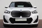 BMW iX1 eDrive20 67 kWh M-Sportpakket Premium Pack / Harman, Auto's, BMW, 27 €/maand, Stof, Lichtsensor, Wit