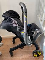 Doona Autostoel met wielen - Zwart, Overige merken, 0 t/m 13 kg, Gebruikt, Autogordel