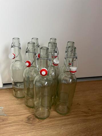 8 beugelflessen beschikbaar voor biedingen