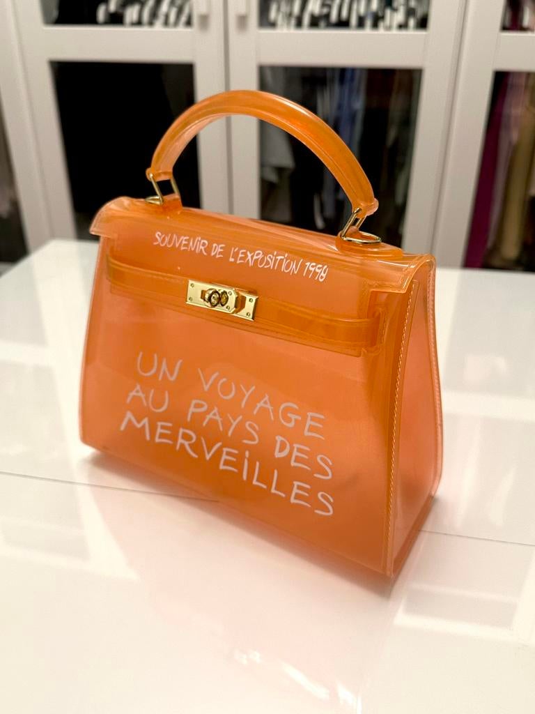 Oranje tas - UN VOYAGE AU PAYS DES MERVEILLES, Ophalen of Verzenden, Nieuw, Oranje