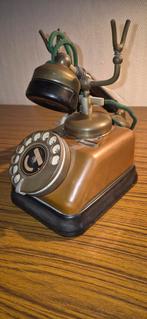 Oude telefoon bakeliet, Ophalen