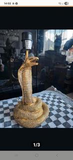 Goudkleurige slangen lamp
35 cm hoog, Huis en Inrichting, Ophalen of Verzenden, Nieuw, Minder dan 50 cm