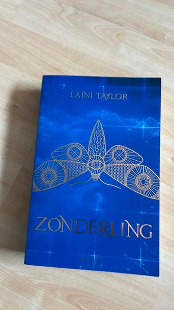 Laini Taylor - Zonderling beschikbaar voor biedingen