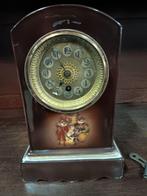 porseleinen tafelklok, Ophalen