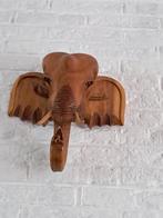 Houten olifanten hoofd., Ophalen