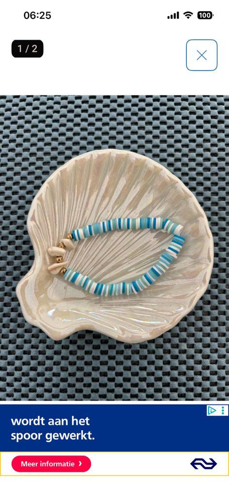 Handgemaakte armband mrt kleuren, Sieraden, Tassen en Uiterlijk, Armbanden, Nieuw, Elastiek, Blauw, Met bedels of kralen, Ophalen of Verzenden