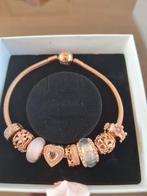 Pandora armband rose kleur 21cm.6 bedels en 2 eindstoppers, Sieraden, Tassen en Uiterlijk, Armbanden, Ophalen of Verzenden, Zo goed als nieuw