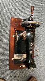 Antieke naaimachine, Ophalen