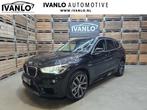 BMW X1 SDrive20i Centennial Executive Xenon Navi Airco Cruis, Auto's, BMW, 1998 cc, Stof, Zwart, Bedrijf
