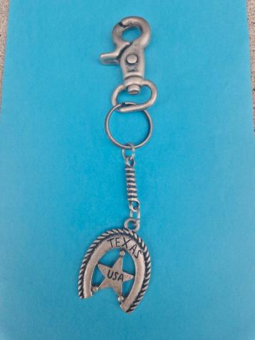 Western cowboy country Texas sleutelhanger  beschikbaar voor biedingen