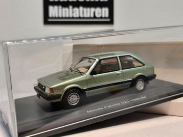 Mazda 323 Familia - 3drs Groen - 1:43 Schuco beschikbaar voor biedingen