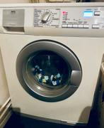 Wasmachine AEG, Witgoed en Apparatuur, Wasmachines, Ophalen, Zo goed als nieuw, 1200 tot 1600 toeren, 85 tot 90 cm