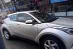 Toyota C-HR 1.8 Hybrid 122pk CVT 2018 Grijs, Auto's, USB, 4 cilinders, 98 pk, Grijs