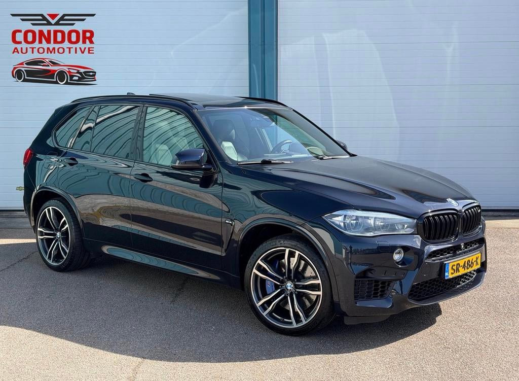BMW X5M 4.4L V8 575PK - B&O - Pano - Carbon - Memory, Auto's, BMW, Automaat, 4395 cc, Zwart, Bedrijf
