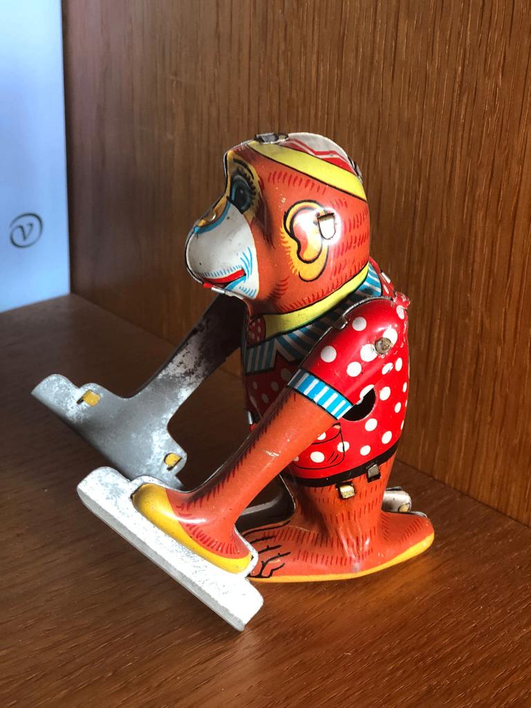 vintage blikken ski-aap / skiing monkey, Ophalen