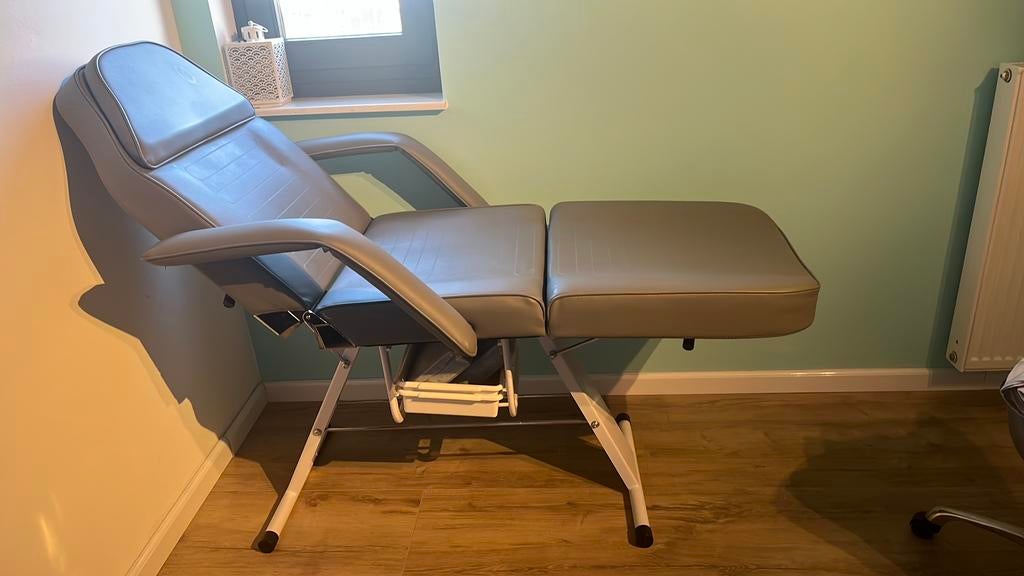 Verstelbare behandelstoel, Ophalen